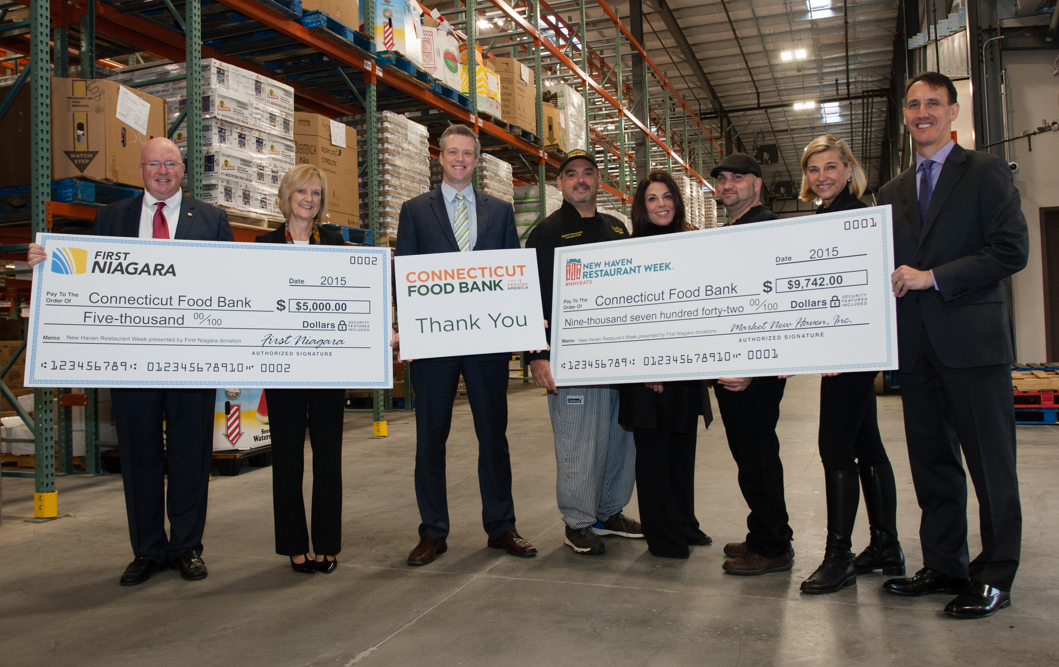 Check presentation to the Connecticut Food Bank. Appearing from left to right: Jeff Hubbard (First Niagara), Karen Crane (First Niagara), Michael Davidow (Connecticut Food Bank), Gerry Iannaccone (Goodfellas Restaurant), Andrea Coppla (Goodfellas Restaurant), Eddie Lavorgna (Basta Trattoria), Anne Worcester (Market New Haven) and Bradley Hardy (First Niagara).